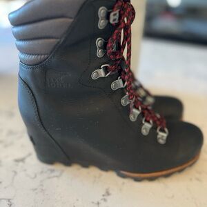 Sorel Black and Red Winter Boots with Rugged Design